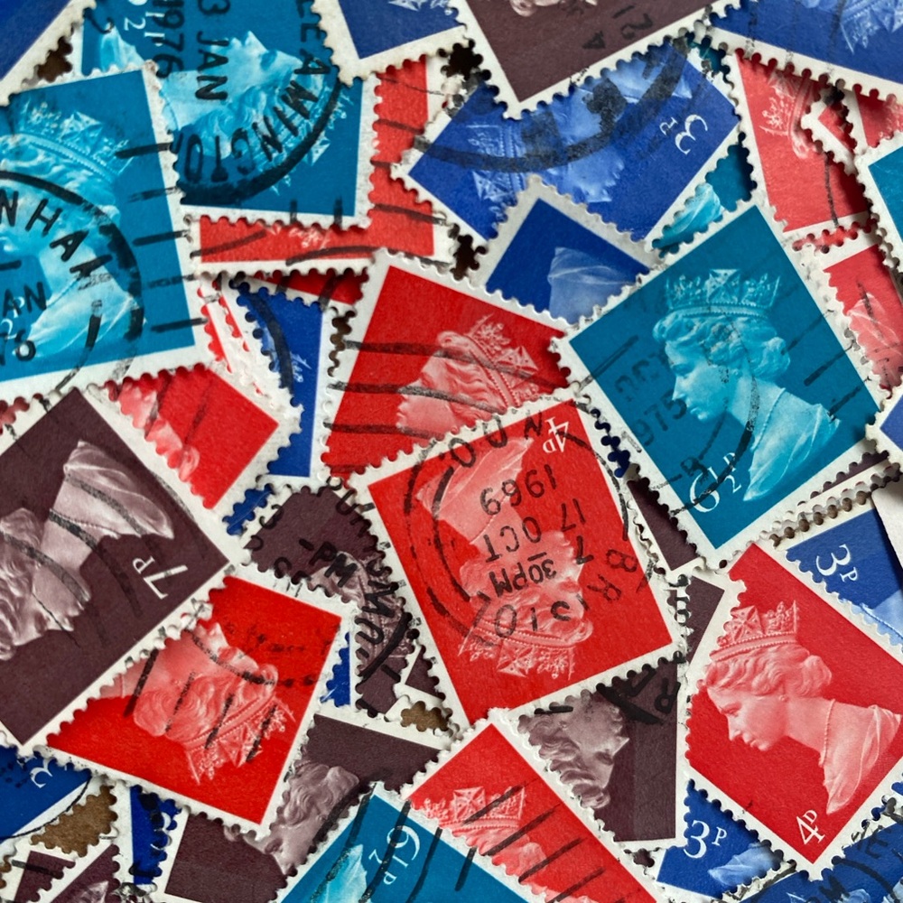 100+ vibrant QEII postage stamps